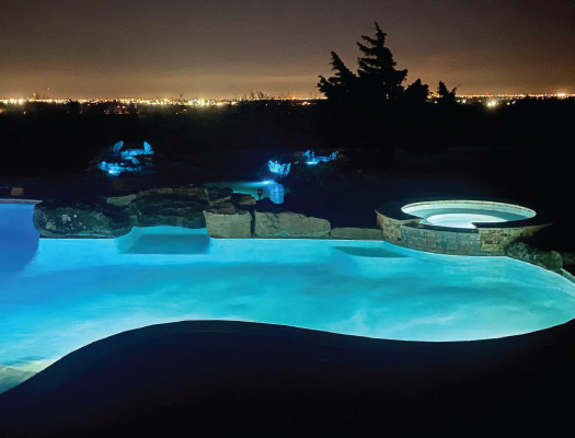 custom designed hot tub and pool by grotto pool designs